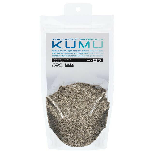 ADA KUMU SA-07 Brook Sand (250ml) – clear resealable package containing fine, natural-colored decorative sand for aquascaping and paludarium use, labeled as part of ADA’s layout materials series.
