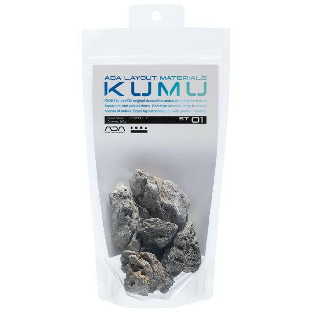 Front view of ADA KUMU ST-01 Ryuoh Stone (300g) in retail packaging, featuring small decorative aquascaping rocks with natural texture and white veins