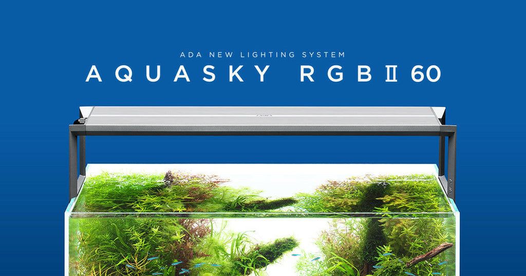 ADA Aquasky RGB II 60 LED lighting system mounted on a planted aquarium, showcasing vibrant plant growth and sleek aluminum design against a blue background