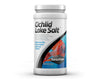 Seachem Cichlid Lake Salt 250 g container featuring a vibrant cichlid fish on the label, designed to replicate the environment of African cichlids.